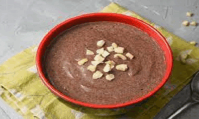 Homemade Ragi Malt served in a bowl with millet and dry fruits