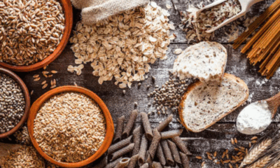 Bowl of Multimillet Atta surrounded by various grains